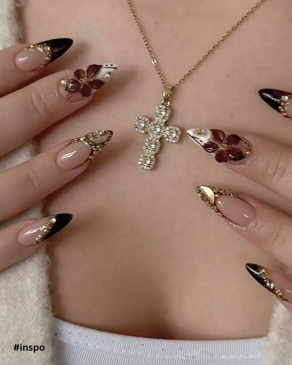 Almond nails with delicate black floral French tips