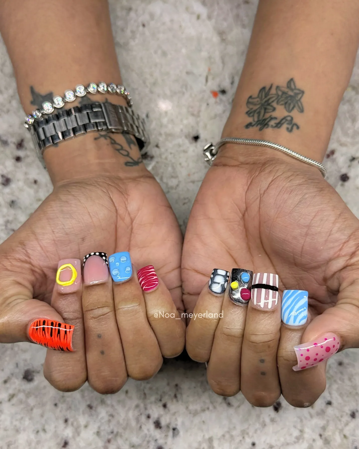 Playful multi-color nail art set with abstract designs