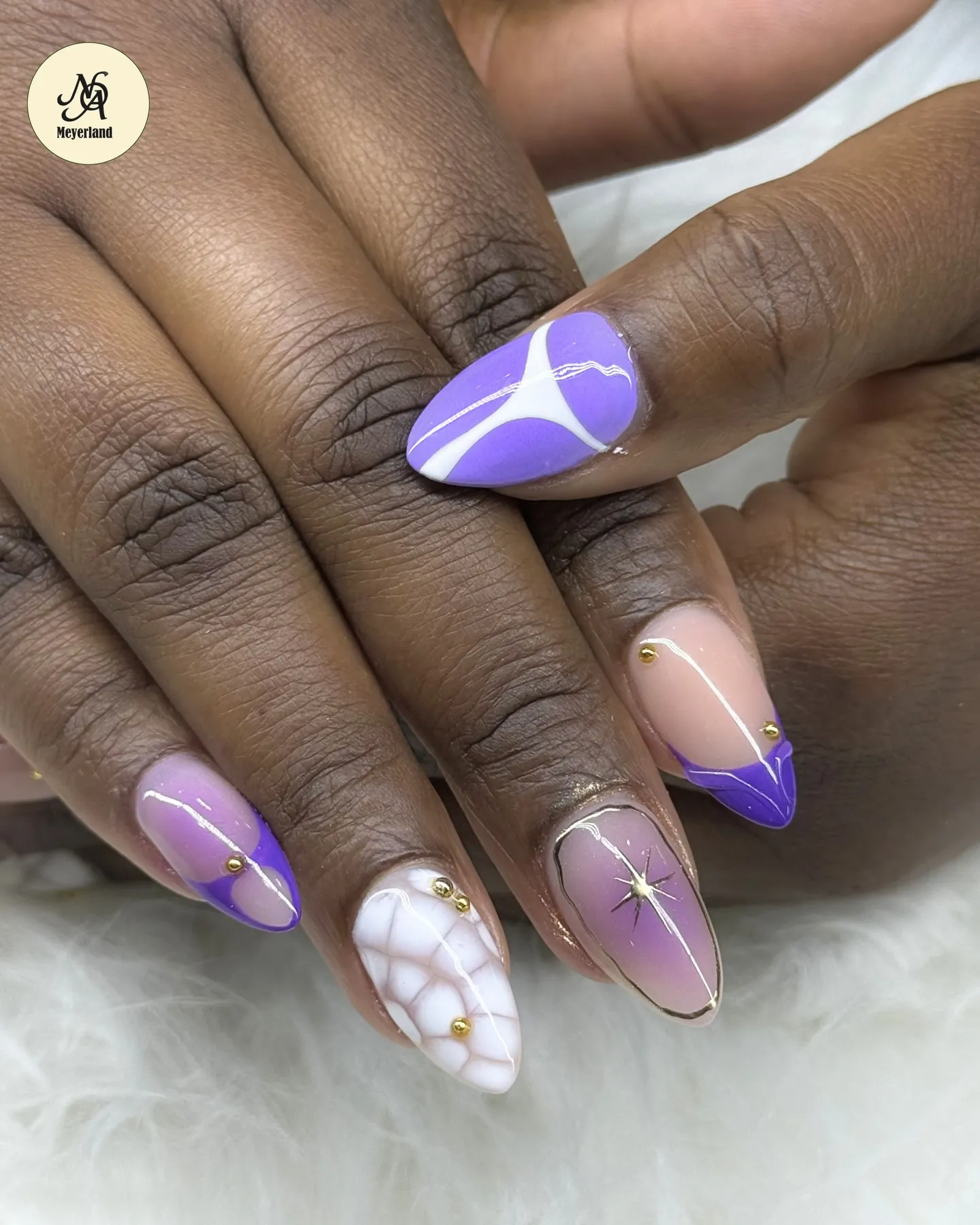 Glossy designer-inspired nail art in cream and pink