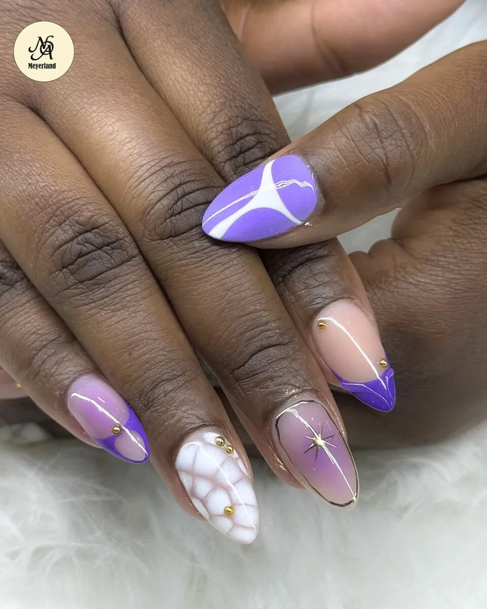 Soft lavender almond nails with hand-painted white flowers