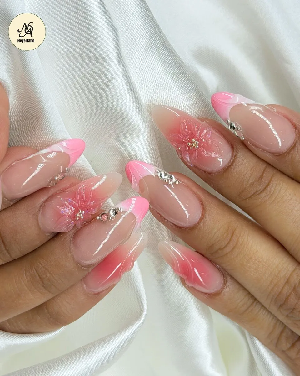Pink coffin nails with a flowing abstract swirl design
