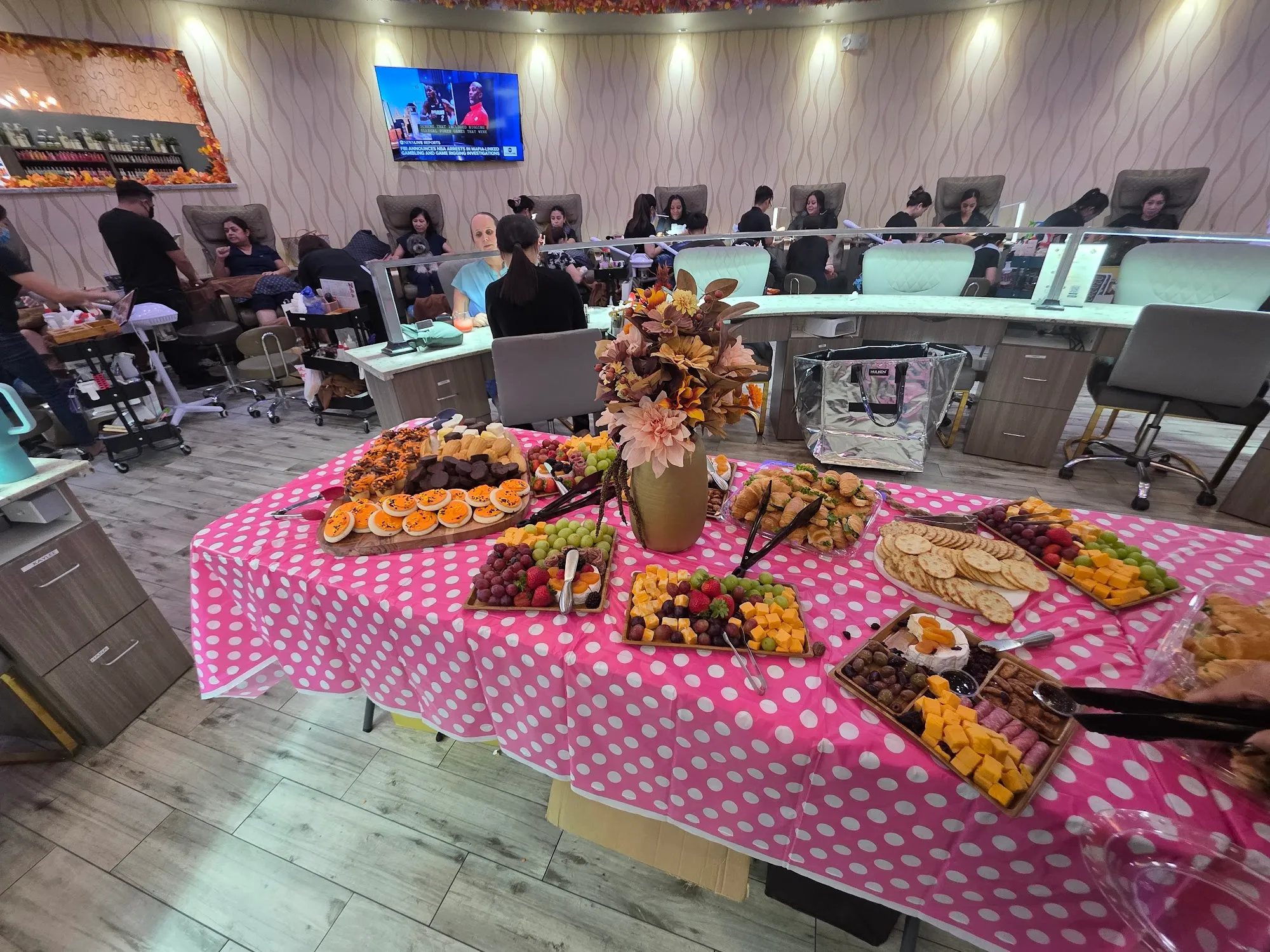 Catered party spread set up in the salon for a private group event
